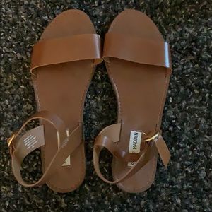 Brown sandals with gold clasp